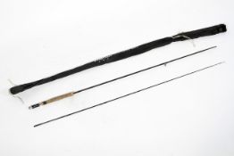 An ABU Custom Graphite two piece #5-6 two piece trout fly rod