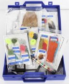 A case of assorted Turrall fishing flies, hooks, thread and other fishing implements