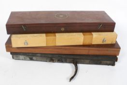 A mahogany and brass mounted gun case,