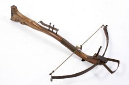 A wooden crossbow, a replica of a 14th century Swiss example, 80 cm.