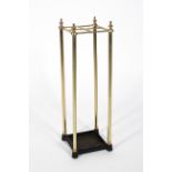 A brass and iron four section umbrella stand, 63cm high,