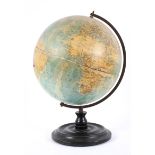 A Phillips 12" Terrestrial Globe, on a turned, ebonised base,