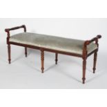 A reproduction Regency style mahogany window seat, with foliated carved handles and legs,