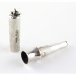 An Edwardian silver cigar piercer with original silver cover by Sampson & Mordan,