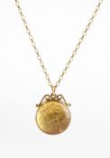 An 1887 full sovereign coin mounted in a glass locket pendant and suspended from a belcher link
