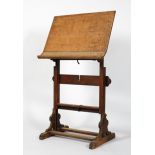 A Victorian oak easel, late 19th century, with adjustable slope and height,