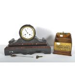 A Victorian black slate and red marble mantel clock and an oak and brass letter box,