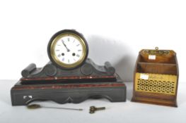 A Victorian black slate and red marble mantel clock and an oak and brass letter box,