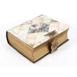 A Victorian leather, mother of pearl and abalone mounted photograph album, with gilt metal clasp,