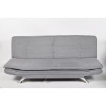 A contemporary click clack sofa bed, with grey marl upholstery and chrome legs, 85cm high,