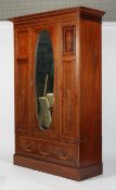 An Edwardian mahogany and satinwood inlaid wardrobe, by 'Edwards & Roberts',