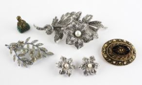 A collection of costume jewellery to include three brooches,