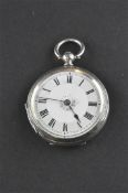 An open face pocket watch. Circular white dial with roman numerals and floral design.