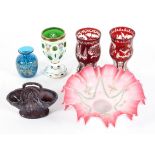 A collection of coloured glass to include a pair of Bohemian style ruby flash vases,