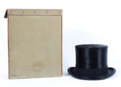 An Austin Reed vintage black silk top hat, in box inscribed 14/20 N/C 12 8 40,