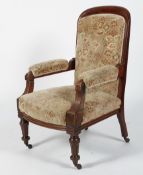 A Victorian walnut armchair, the arched back above upholstered arms, stuffed over seat,