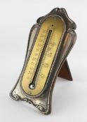 An Art Nouveau silver-mounted brass thermometer, hallmarked Birmingham, 1904, William Hutton & Sons,