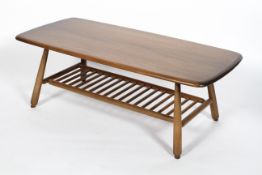 An Ercol coffee table, model no 459, in dark colourway, on splayed legs with lower slated shelf,