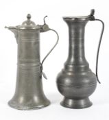 Two 19th century pewter flagon's, each bearing stamped marks,