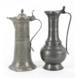 Two 19th century pewter flagon's, each bearing stamped marks,