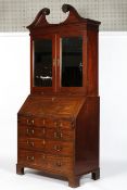 A George III and later mahogany bureau bookcase,