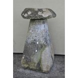 A limestone staddle stone, the top on a tapering square section base, 85cm high, 50cm wide,