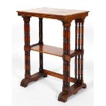 A late Victorian mahogany nest of three tables, on ring turned legs,