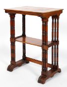 A late Victorian mahogany nest of three tables, on ring turned legs,