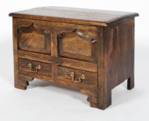 A miniature oak mule chest, perhaps with 18th century woods,