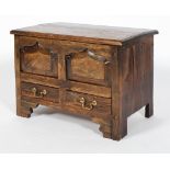 A miniature oak mule chest, perhaps with 18th century woods,