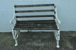 A pair of Victorian cast iron bench ends, probably Coalbrookdale, cast with dogs head finial's,