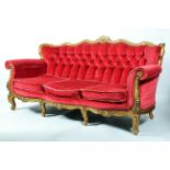 A French neo-rococo style giltwood three seater sofa, probably early 20th century,