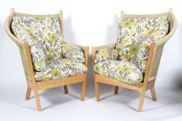 A pair of Semarang contemporary conservatory lounge chairs made by The Fair Trade Company