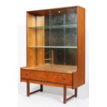 A 1960's Turnidge teak wood mirror backed glass display cabinet having twin glazed sliding doors