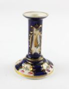 An English porcelain blue-ground chamber candlestick, circa 1820, probably Derby or Coalport,