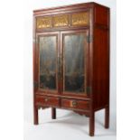 A large Chinese wedding armoire,