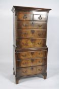 A George II style walnut chest on chest,