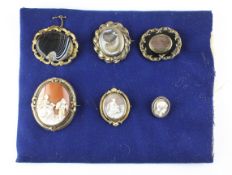 A collection of collection of large abstract brooches to include three mourning,