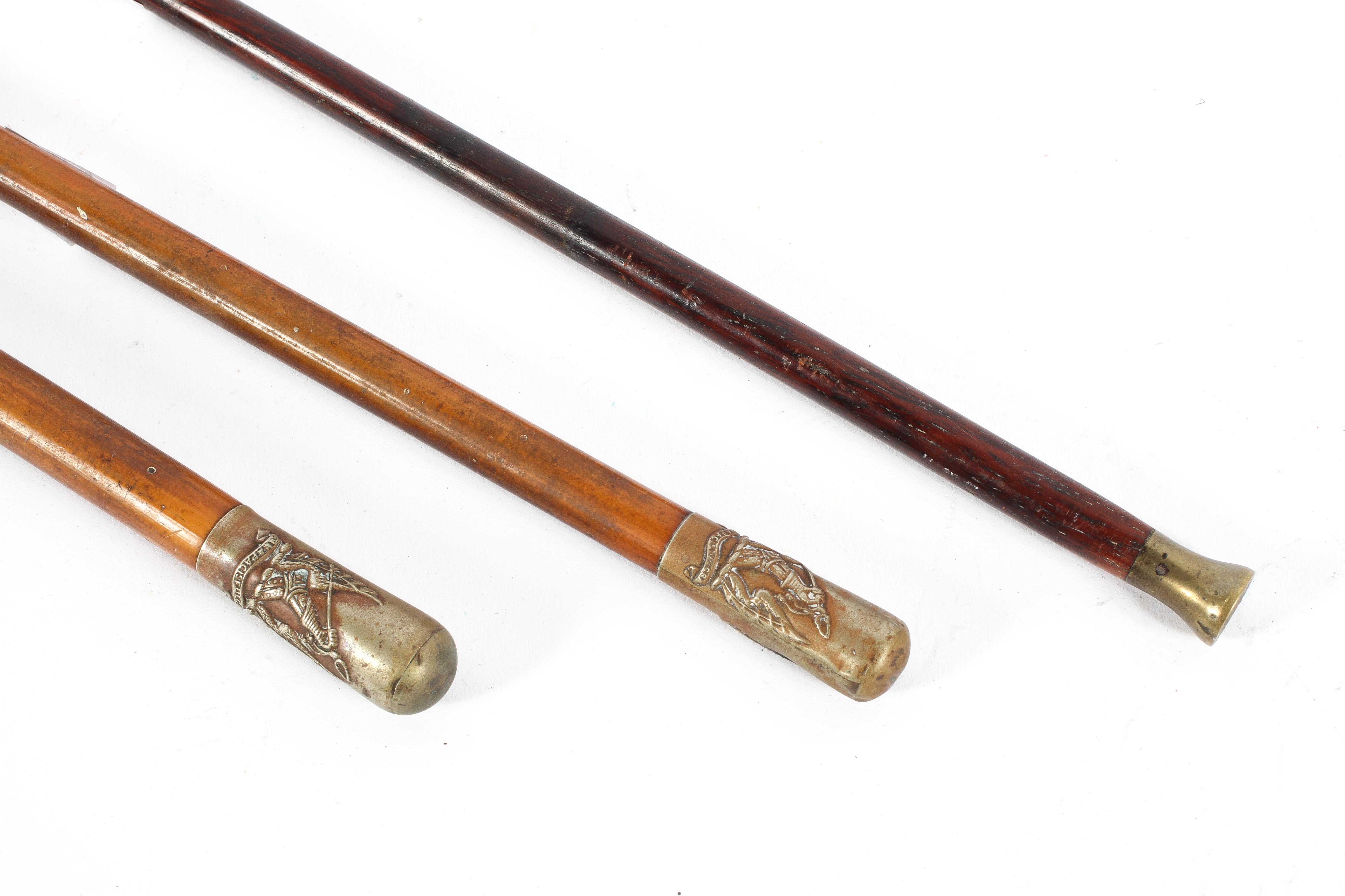 Three brass-mounted wooden swagger sticks, - Image 2 of 2