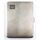 An Art Deco silver cigarette case of rectangular form,