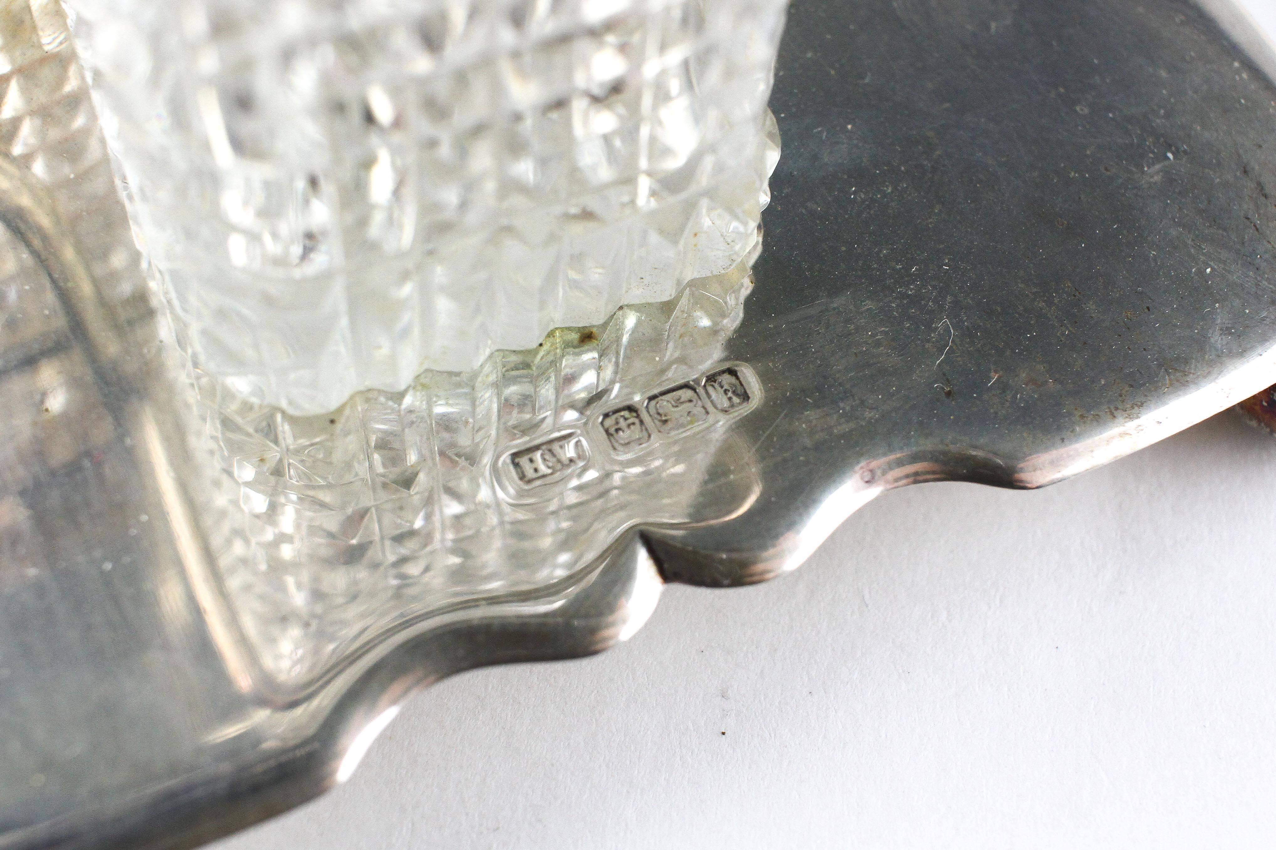 An Edwardian silver cruet on stand, comprising two silver topped glass pots and a glass bottle, - Image 3 of 3