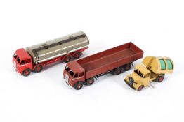 Three vintage play worn Dinky Supertoys, comprising: a Foden tanker,