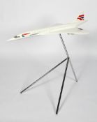 A large advertising model of Concorde in British Airways livery, used in a travel agents,