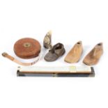 Two wooden child's shoe moulds and other items,