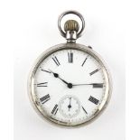 An open face pocket watch. Circular white dial with Roman numerals.