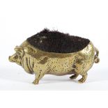 A Victorian brass pig-shaped pen wipe, late 19th century,