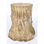 A Victorian buff stoneware garden seat, cast in the form of a tree trunk, late 19th century,