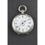 An open face pocket watch. Circular white dial with floral design and roman numerals.