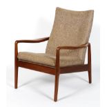 A Greaves & Thomas 1960's vintage teak wood easy lounge chair having a shaped propeller armrest