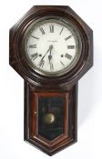 Seth Thomas (American) wall clock, within stained oak moulded octagonal case,